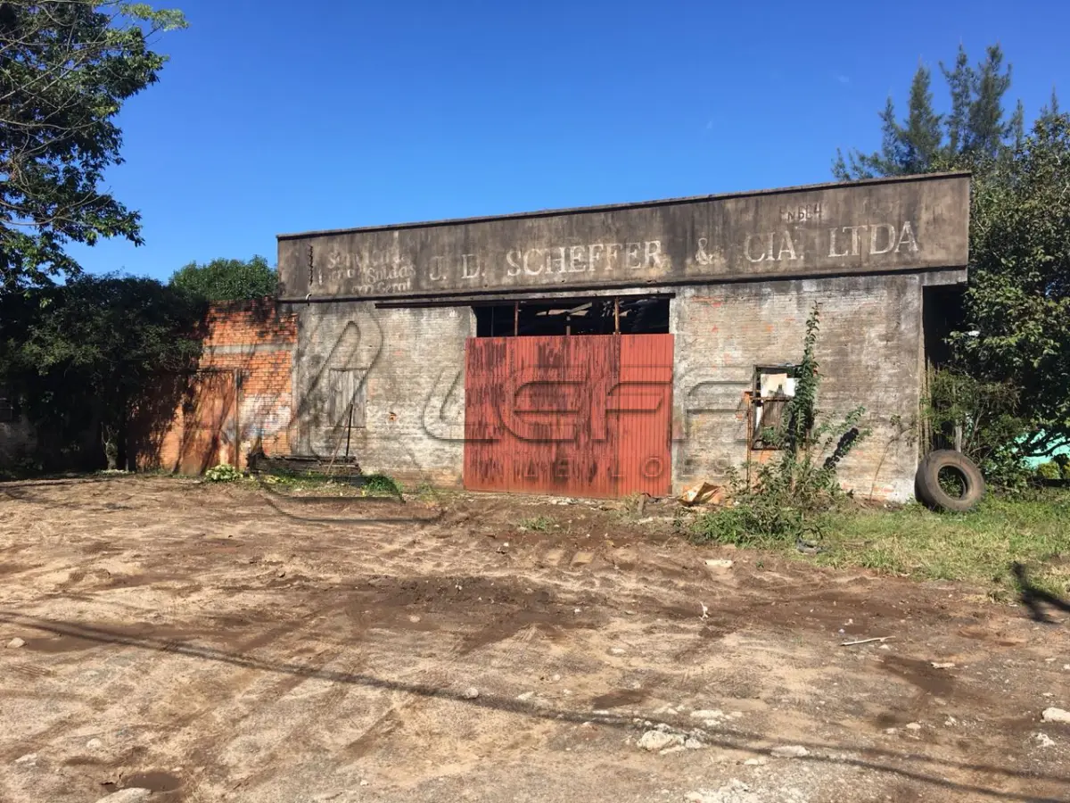 LOTE 001 - TERRENO URBANO COM BENFEITORIAS NA VILA SÃO JOÃO EM TORRES/RS