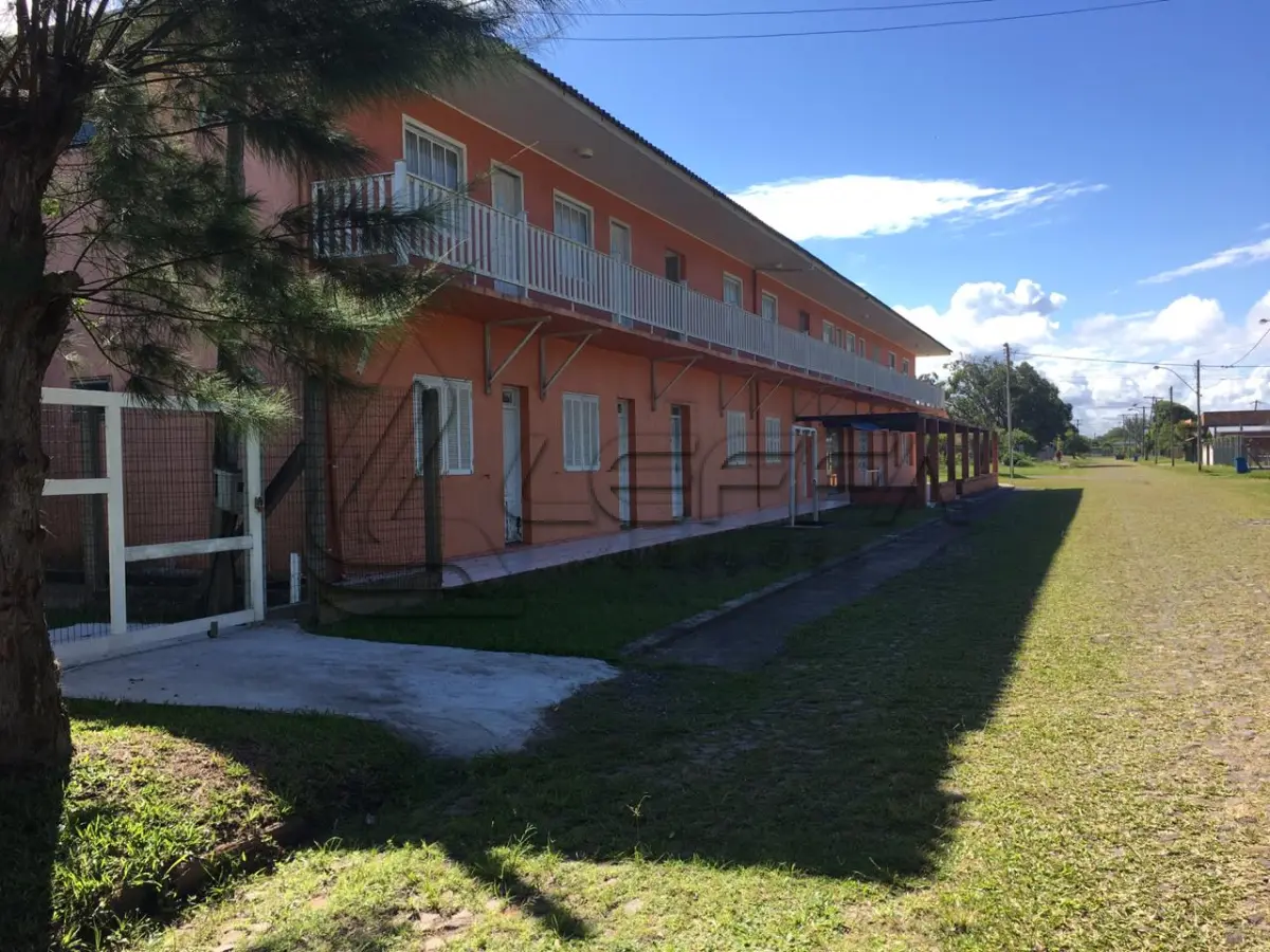 LOTE 004 - UM TERRENO URBANO, COM UM PRÉDIO UTILIZADO COMO HOTEL  EM ARROIO DO SAL/RS