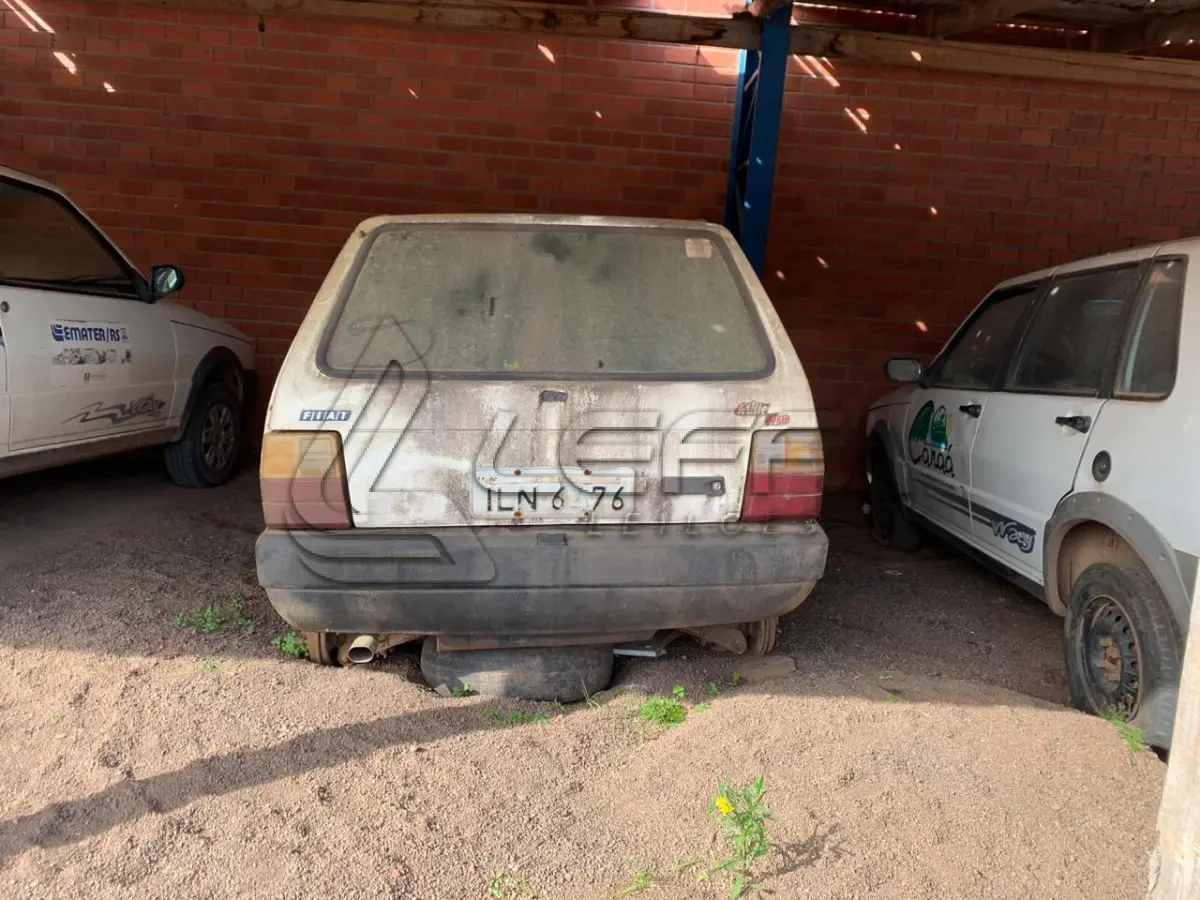 LOTE 005 - FIAT/UNO MILLE FIRE, placas ILN-6476, gasolina, ano 2003 e modelo 2003, cor branca