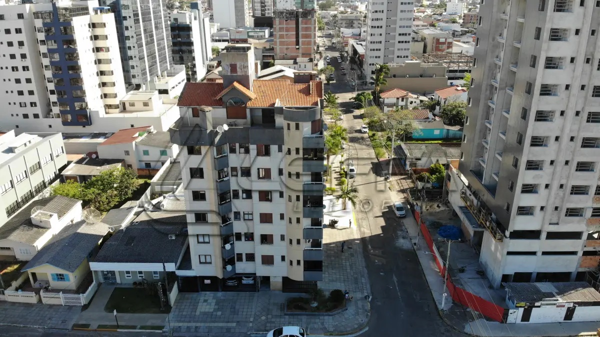 LOTE 002 - Apartamento 201 e Box 06, do Edifício Residencial Porto Seguro no Centro de Torres/RS