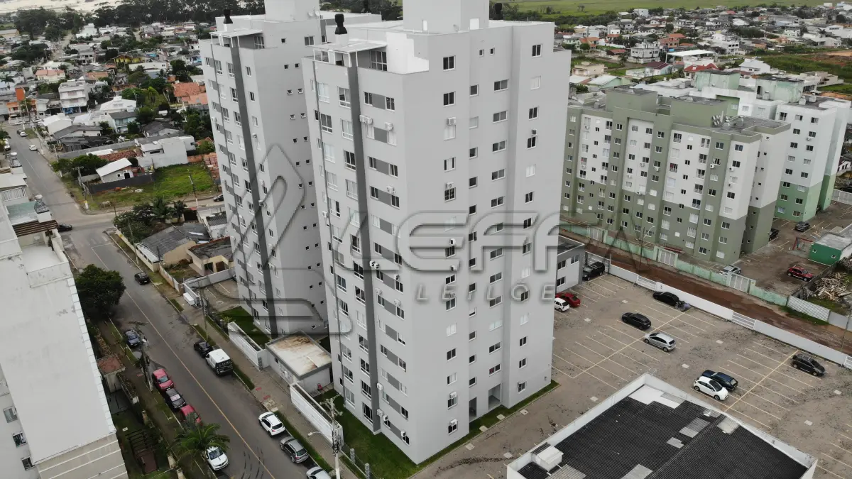 LOTE 001 - Apartamento nº 1203 e box de garagem nº 111, do Edifício Residencial Due Fratelli, em Torres/RS