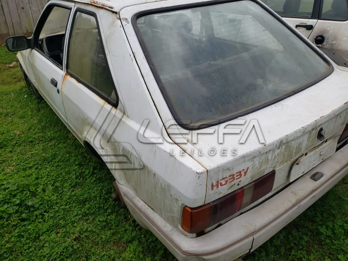 LOTE 016 - UM VEÍCULO FORD/ESCORT 1.0 HOBBY, PLACAS ICQ-5648, ANO 1995, MODELO 1995