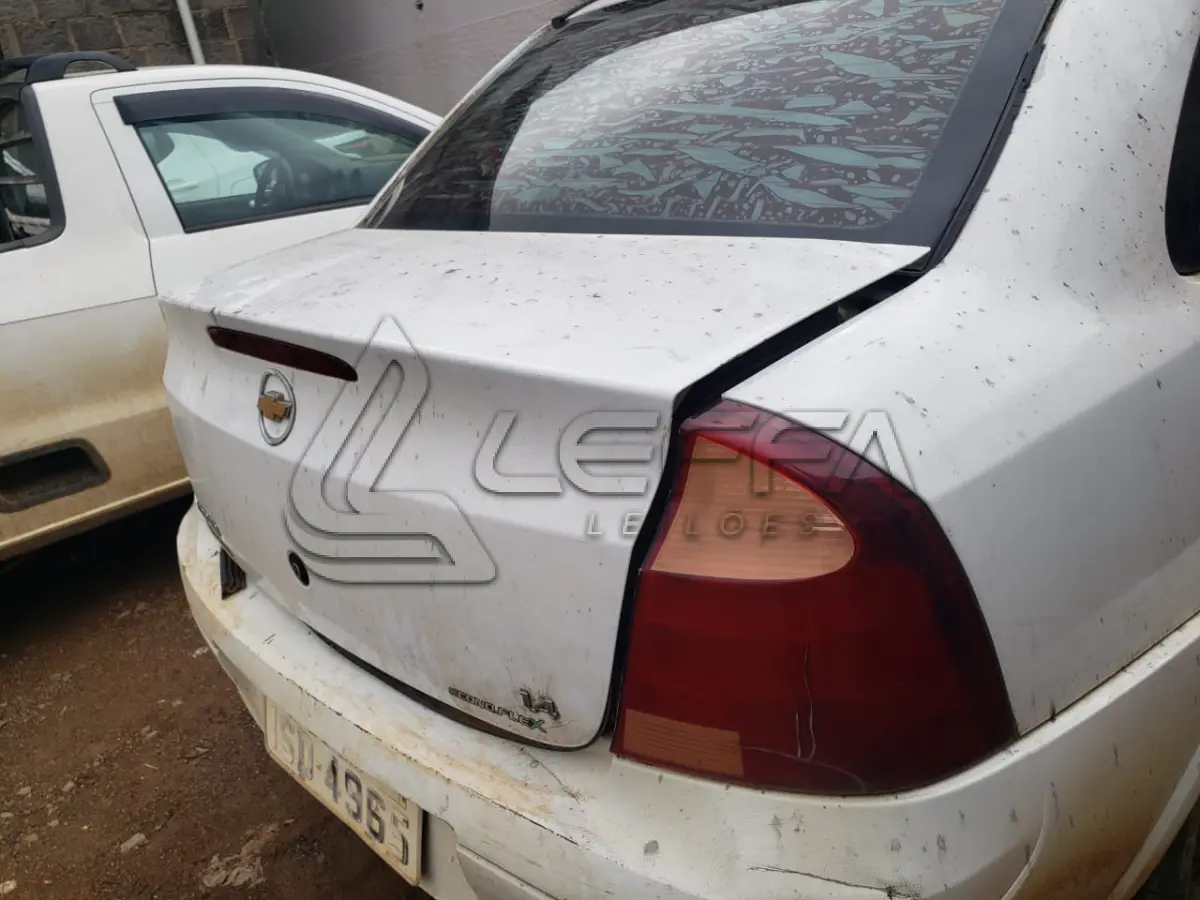 LOTE 001 - UM VEÍCULO GM/CORSA SEDAN PREMIUM, FLEX, PLACAS ISD-4965, ANO 2011, MODELO 2012