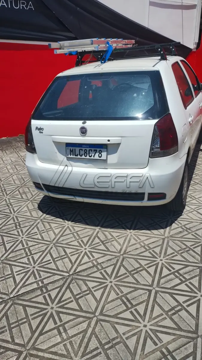 LOTE 003 - Um veículo automóvel nacional marca FIAT/PALIO FIRE ECONOMY,  cor branca, a álcool/gasolina, ano de fabricação e modelo 2012/2013, placa  MLC8C78