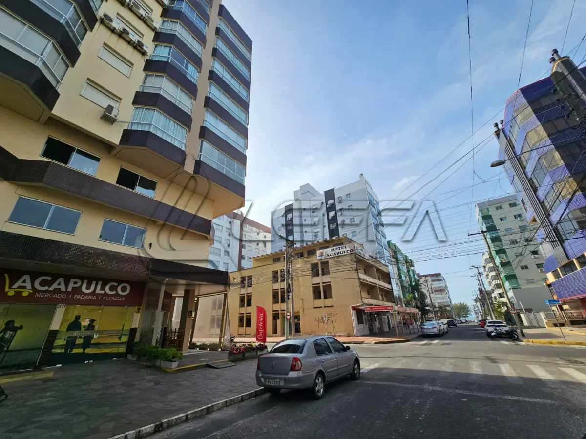 LOTE 001 - UM APARTAMENTO N° 504 (QUINHENTOS E QUATRO), do Edifício Comercial e Residencial TUIANE, situado na Rua 4 (quatro), n° 1143, na Praia ZONA NOVA DE CAPÃO DA CANOA, neste Município de CAPÃO DA CANOA/RS