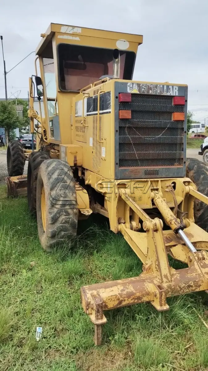 LOTE 001 - MOTONIVELADORA CATERPILLAR 120H 2849 ANO/MODELO 2003 