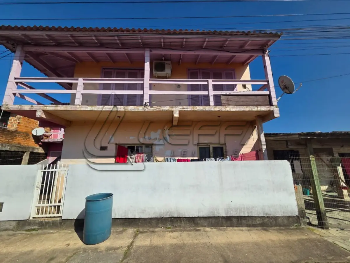 LOTE 001 - DIREITOS POSSESSÓRIOS DO IMÓVEL ASSIM DESCRITO: UM TERRENO  URBANO, localizado na Rua Feliz, nº 1750, Bairro Curtume, cidade de Torres/RS