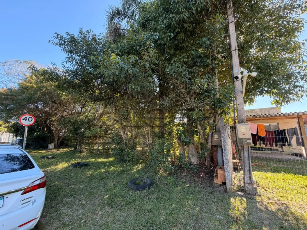 UM TERRENO URBANO DE APROXIMADAMENTE 1.200,00m², COM BENFEITORIAS, SITUADO NO BAIRRO GUARÁ, MUNICÍPIO DE XANGI-LÁ/RS