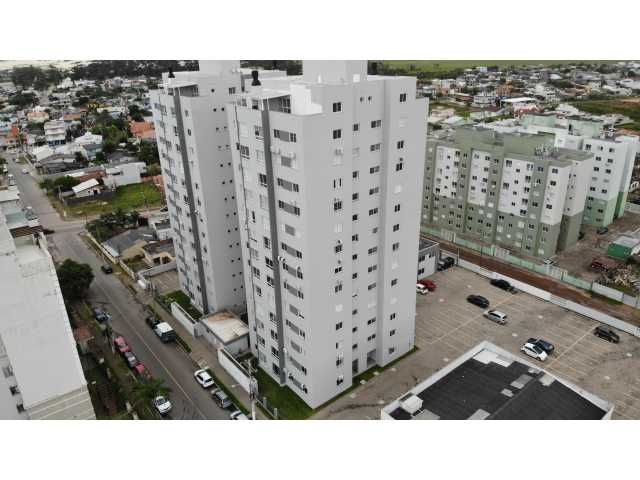 Apartamento nº 1203 e box de garagem nº 111, do Edifício Residencial Due Fratelli, em Torres/RS