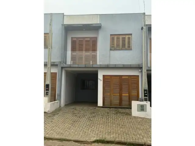 Casa em condomínio, com dois pavimentos, localizada no município de Estância Velha/RS, com área construída total de 69,83 m²