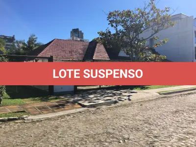 LOTE 001 - TERRENO URBANO COM BENFEITORIAS NA RUA SALDANHA GAMA EM TORRES/RS