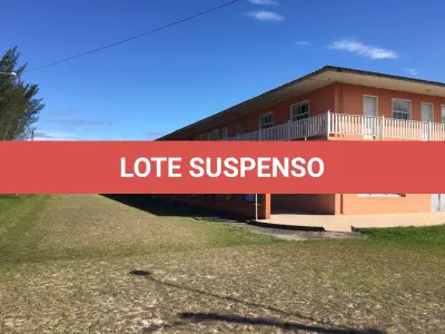 LOTE 004 - UM TERRENO URBANO, COM UM PRÉDIO UTILIZADO COMO HOTEL  EM ARROIO DO SAL/RS