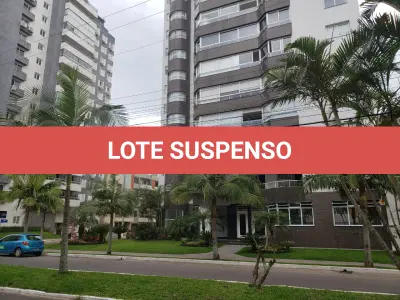 LOTE 001 - Apartamento 1201 e 2 box do edificio Estevanell, na avenida Silva Jardim no Centro em Torres/RS