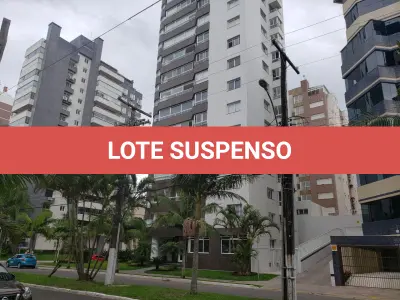 LOTE 001 - Apartamento 1201 e 2 box do edificio Estevanell, na avenida Silva Jardim no Centro em Torres/RS