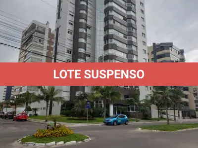 LOTE 001 - Apartamento 1201 e 2 box do edificio Estevanell, na avenida Silva Jardim no Centro em Torres/RS