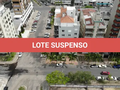 LOTE 001 - Apartamento 703 e Box 06, do Edifício Marichien no Centro de Torres/RS