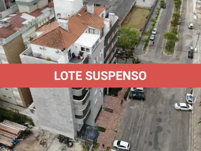 LOTE 001 - Apartamento 703 e Box 06, do Edifício Marichien no Centro de Torres/RS