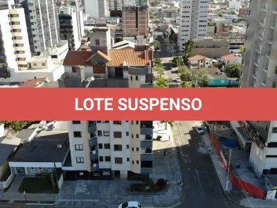 LOTE 002 - Apartamento 201 e Box 06, do Edifício Residencial Porto Seguro no Centro de Torres/RS