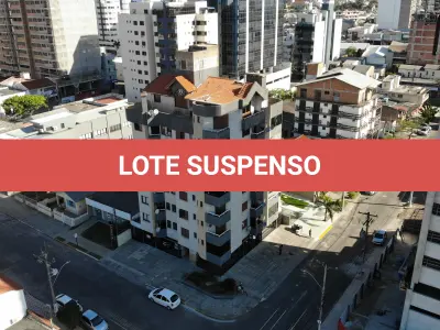LOTE 002 - Apartamento 201 e Box 06, do Edifício Residencial Porto Seguro no Centro de Torres/RS