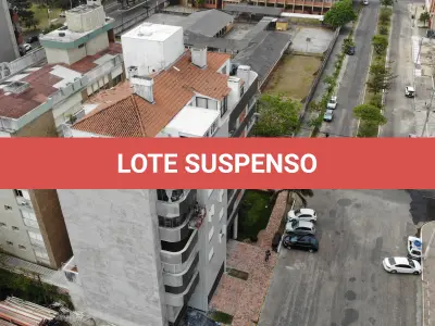 LOTE 001 - Apartamento 703 e Box 06, do Edifício Marichien no Centro de Torres/RS