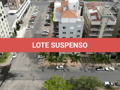 LOTE 001 - Apartamento 703 e Box 06, do Edifício Marichien no Centro de Torres/RS
