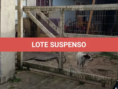 LOTE 001 - Terreno Urbano, com benfeitorias, localizado na rua Feliz, numero 70, em Torres/RS