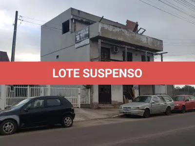 LOTE 001 - UM TERRENO URBANO, com benfeitorias, localizado na Avenida Independência, 1080, Bairro Curtume, na Cidade de Torres/RS