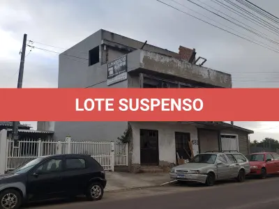 LOTE 001 - UM TERRENO URBANO, com benfeitorias, localizado na Avenida Independência, 1080, Bairro Curtume, na Cidade de Torres/RS