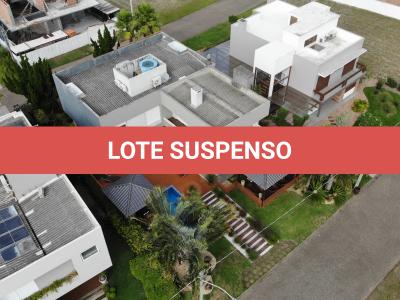 LOTE 001 - UMA CASA DE ALVENARIA COM APROXIMADAMENTE 340,10M² CONSTRUÍDA SOBRE O LOTE F6 DA QUADRA F, DO CONDOMÍNIO HORIZONTAL OCEAN SIDE, TORRES/RS