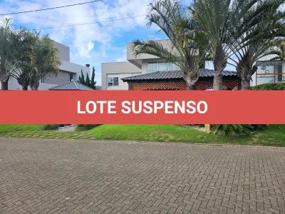 LOTE 001 - UMA CASA DE ALVENARIA COM APROXIMADAMENTE 340,10M² CONSTRUÍDA SOBRE O LOTE F6 DA QUADRA F, DO CONDOMÍNIO HORIZONTAL OCEAN SIDE, TORRES/RS