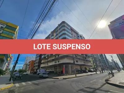LOTE 001 - UM APARTAMENTO N° 504 (QUINHENTOS E QUATRO), do Edifício Comercial e Residencial TUIANE, situado na Rua 4 (quatro), n° 1143, na Praia ZONA NOVA DE CAPÃO DA CANOA, neste Município de CAPÃO DA CANOA/RS