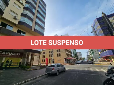 LOTE 001 - UM APARTAMENTO N° 504 (QUINHENTOS E QUATRO), do Edifício Comercial e Residencial TUIANE, situado na Rua 4 (quatro), n° 1143, na Praia ZONA NOVA DE CAPÃO DA CANOA, neste Município de CAPÃO DA CANOA/RS