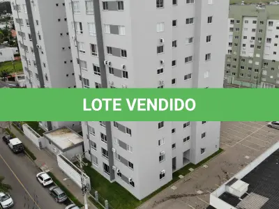 LOTE 001 - Apartamento nº 1203 e box de garagem nº 111, do Edifício Residencial Due Fratelli, em Torres/RS