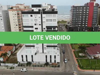LOTE 001 - Apartamento e dois box de garagem, no Edifício Ilha dos Açores, em Capão da Canoa/RS