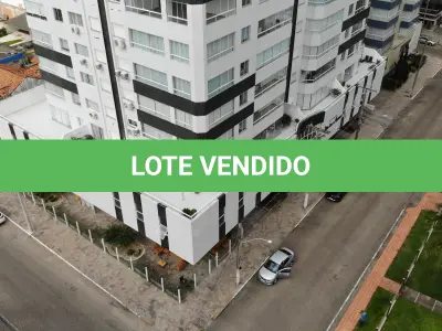 LOTE 001 - Apartamento e dois box de garagem, no Edifício Ilha dos Açores, em Capão da Canoa/RS