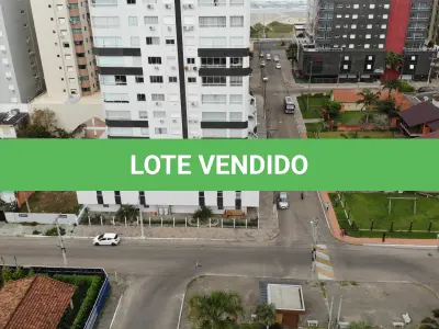 LOTE 001 - Apartamento e dois box de garagem, no Edifício Ilha dos Açores, em Capão da Canoa/RS