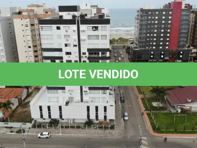 LOTE 001 - Apartamento e dois box de garagem, no Edifício Ilha dos Açores, em Capão da Canoa/RS