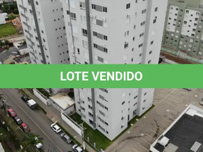 LOTE 001 - Apartamento nº 1203 e box de garagem nº 111, do Edifício Residencial Due Fratelli, em Torres/RS