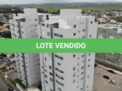 LOTE 001 - Apartamento nº 1203 e box de garagem nº 111, do Edifício Residencial Due Fratelli, em Torres/RS