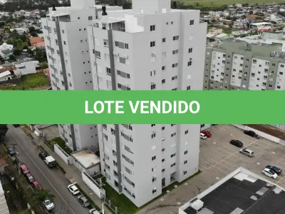 LOTE 001 - Apartamento nº 1203 e box de garagem nº 111, do Edifício Residencial Due Fratelli, em Torres/RS