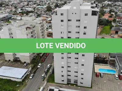 LOTE 001 - Apartamento nº 1203 e box de garagem nº 111, do Edifício Residencial Due Fratelli, em Torres/RS