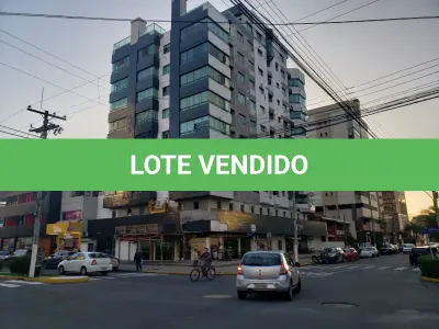 LOTE 001 - APARTAMENTO Nº 903 E BOX DE GARAGEM Nº 01 DO EDIFÍCIO MONTE BELLO EM TORRES RS