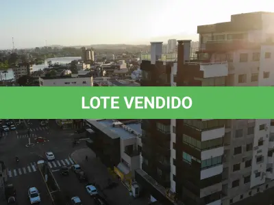 LOTE 001 - APARTAMENTO Nº 903 E BOX DE GARAGEM Nº 01 DO EDIFÍCIO MONTE BELLO EM TORRES RS