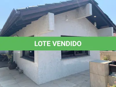 LOTE 001 - APARTAMENTO (TIPO COBERTURA) Nº 501 E VAGAS DE GARAGENS NºS 02 E 06, DO EDIFÍCIO CINARA, NA CIDADE DE CAPÃO DA CANOA/RS
