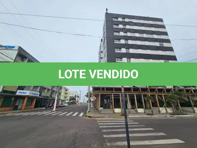 LOTE 001 - UM APARTAMENTO NÚMERO 402 DO ED. RESIDENCIAL E COMERCIAL MIAMI PALACE, E BOX DE GARAGEM NÚMERO 101 DO MESMO EDIFÍCIO