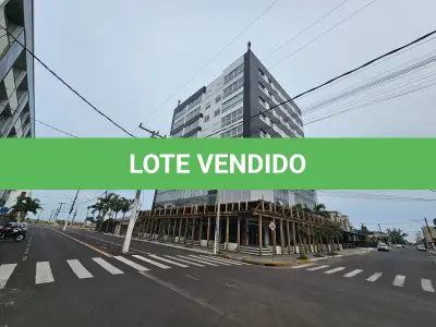 LOTE 001 - UM APARTAMENTO NÚMERO 402 DO ED. RESIDENCIAL E COMERCIAL MIAMI PALACE, E BOX DE GARAGEM NÚMERO 101 DO MESMO EDIFÍCIO