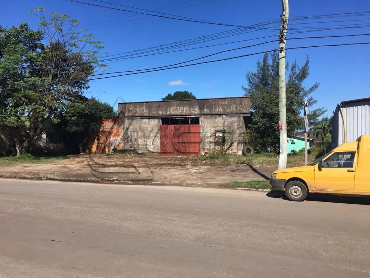 LOTE 001 - TERRENO URBANO COM BENFEITORIAS NA VILA SÃO JOÃO EM TORRES/RS
