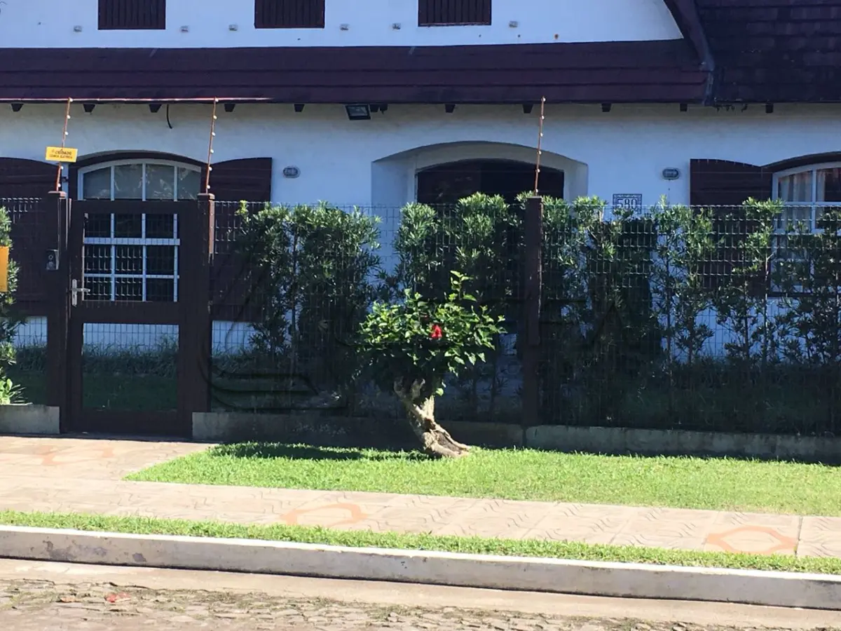 LOTE 001 - TERRENO URBANO COM BENFEITORIAS NA RUA SALDANHA GAMA EM TORRES/RS