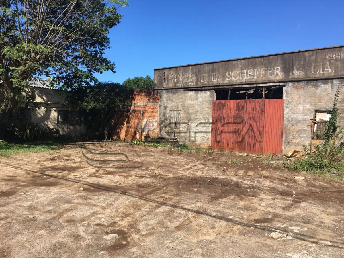 LOTE 001 - TERRENO URBANO COM BENFEITORIAS NA VILA SÃO JOÃO EM TORRES/RS