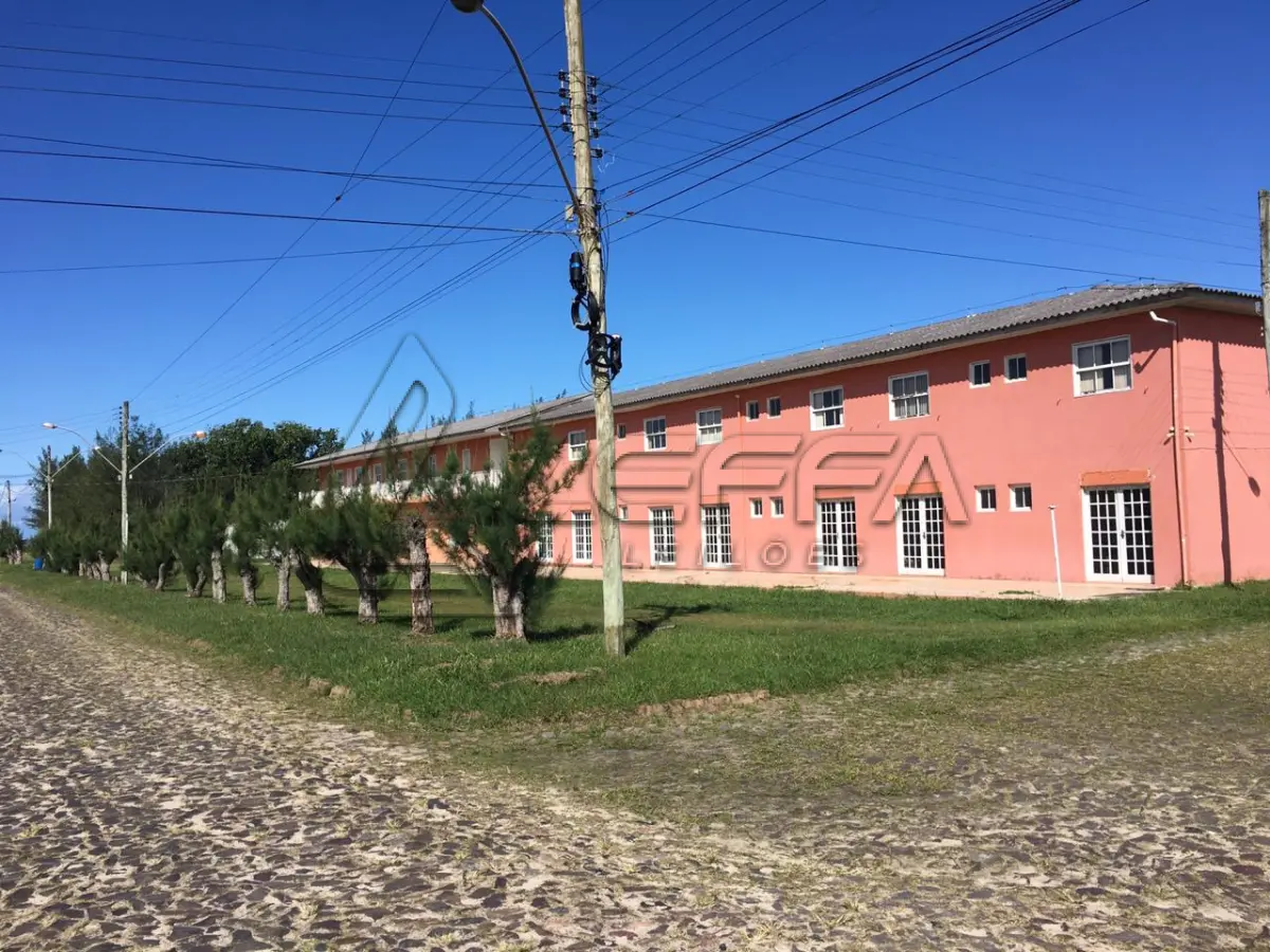 LOTE 004 - UM TERRENO URBANO, COM UM PRÉDIO UTILIZADO COMO HOTEL  EM ARROIO DO SAL/RS